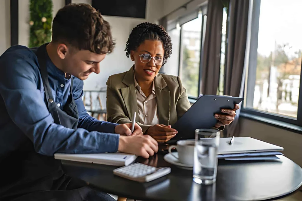 Small business owner meeting with certified accountant
